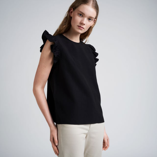 Blus med volang DISA